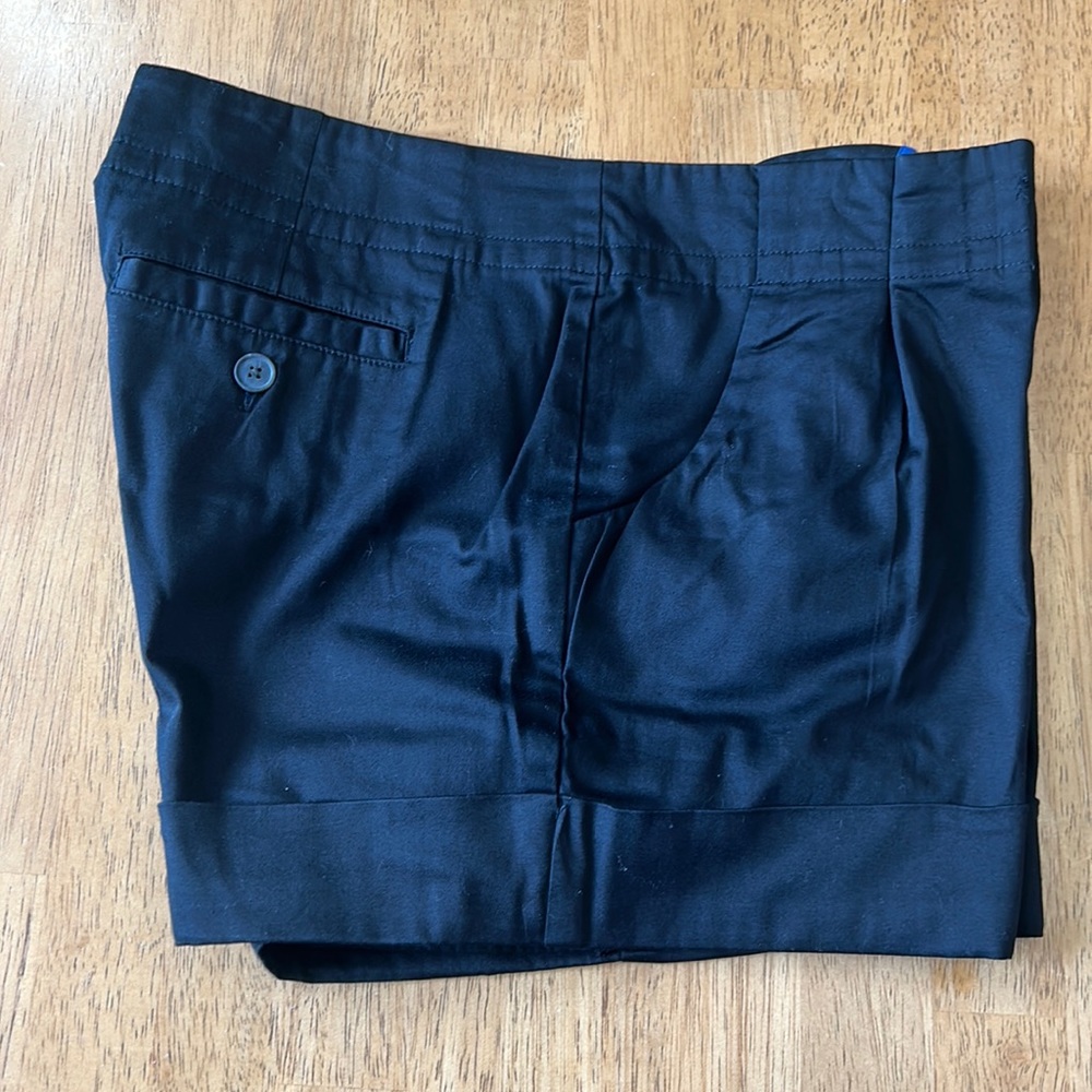 Mossimo black shorts, pleated and cuffed, size 8.